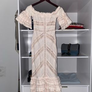 Ruffled off shoulder dress.